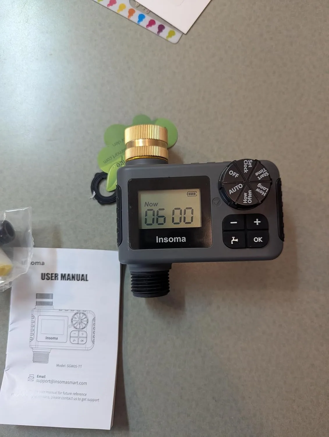 Customer photo of drip irrigation timer installed on camellia hedge watering setup